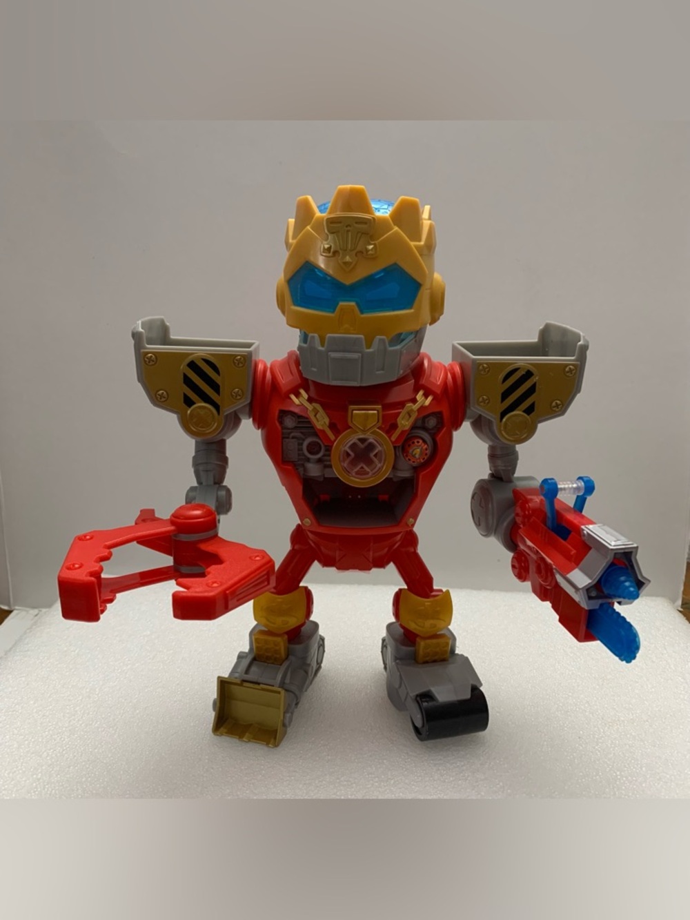 Red and Yellow Robot Action Figure Toy with Blue Accents